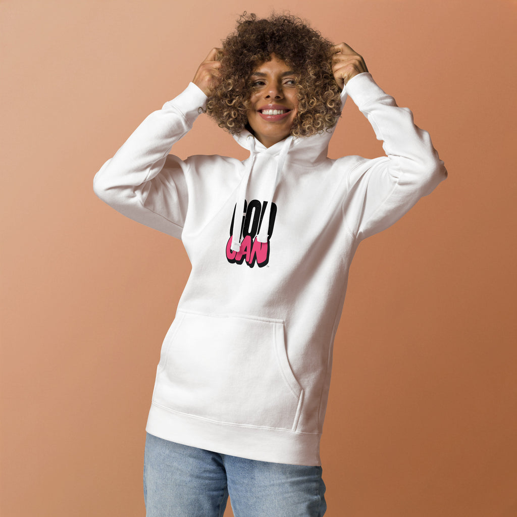 Person wearing a white hoodie with colorful text on a beige background