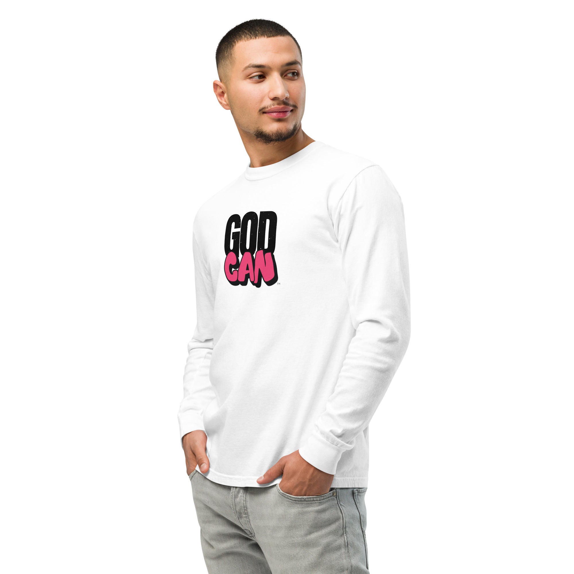 man wearing unisex-garment-dyed-heavyweight-long-sleeve-shirt-white-left-with God Can image on the front.